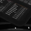 Close-up of Adobe Mac keyboard shortcut mat highlighting key functions for streamlined design workflows.