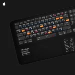 Adobe Graphic Designer Mac desk mat positioned with a keyboard, showcasing its practical design for designers and creatives.