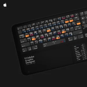 Adobe Graphic Designer Mac desk mat positioned with a keyboard, showcasing its practical design for designers and creatives.