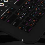 DaVinci Resolve desk mat placed in a professional studio setup, enhancing workflow efficiency for editing projects.