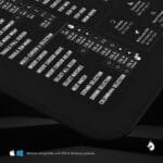 Close-up of VS Code keyboard shortcut mat highlighting key functions for streamlined development workflows