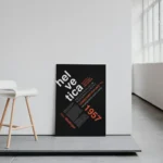 Helvetica alphabet poster showing A–Z, numbers, and punctuation in high-contrast layout.