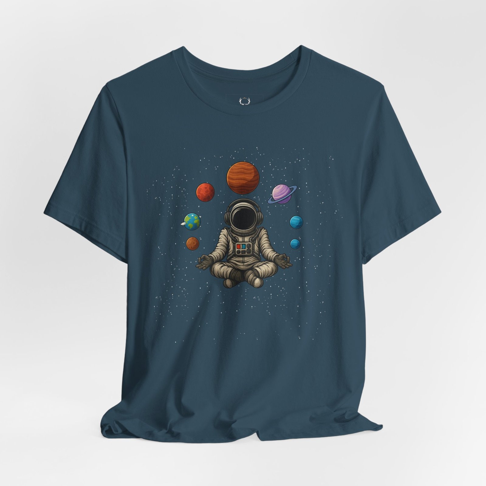 Solar system meditation graphic t-shirt showing cosmic astronaut with planets, galaxy streetwear for festivals and urban looks.