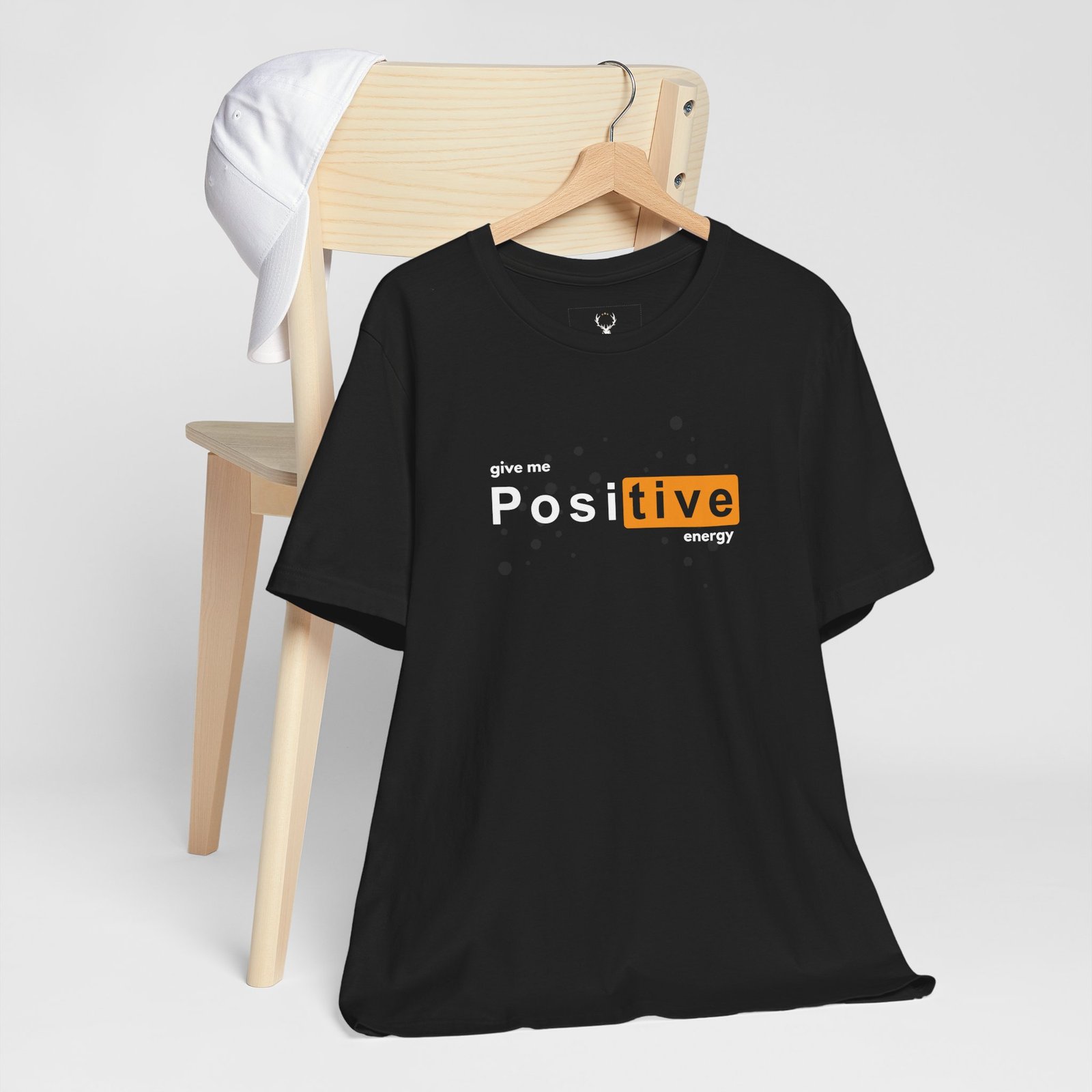 Minimalist Positive Energy T-Shirt with motivational text, designed for inspirational streetwear fashion and uplifting confidence.