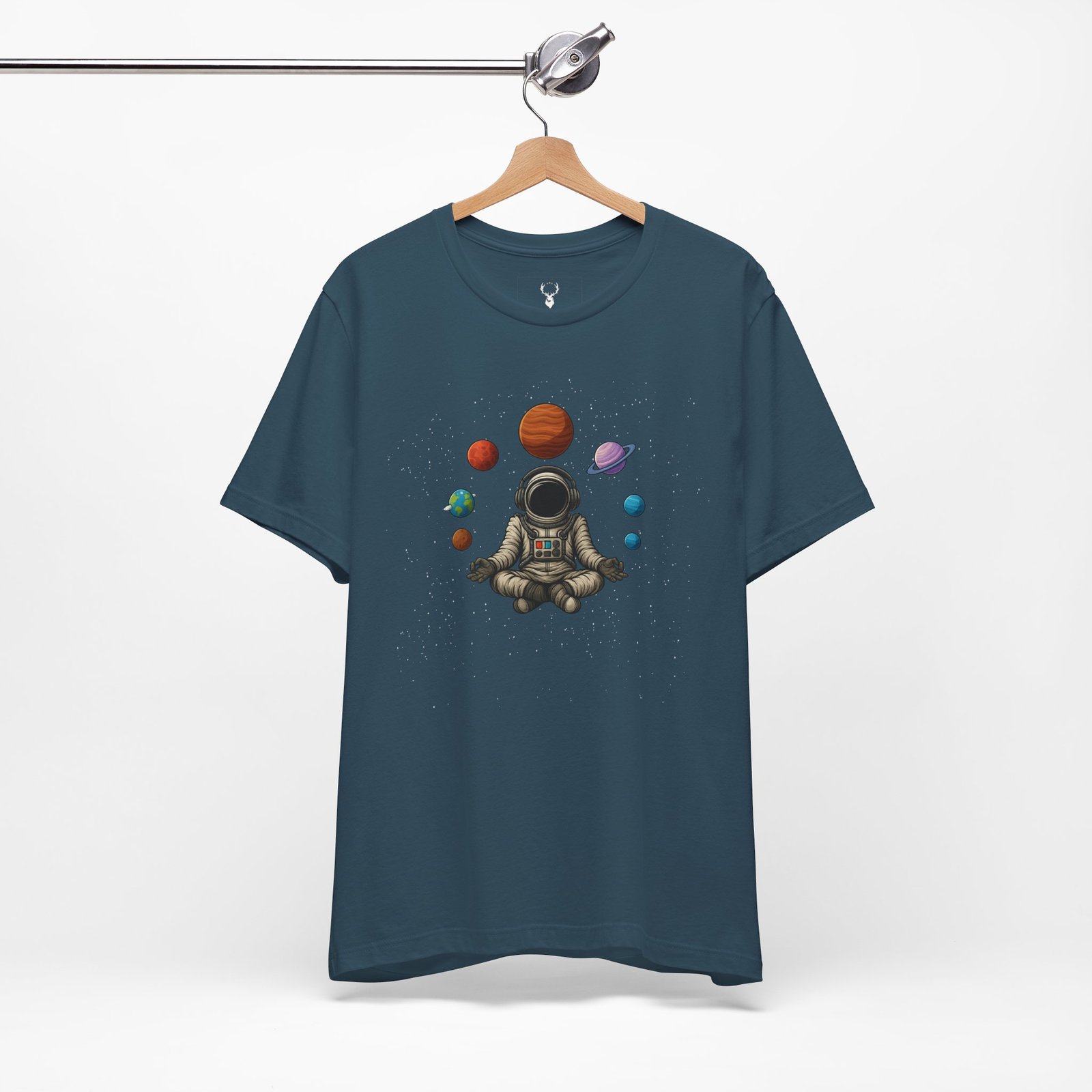 Psychedelic astronaut meditation tee featuring cosmic planets, intergalactic artwork, and futuristic EDM streetwear fashion.