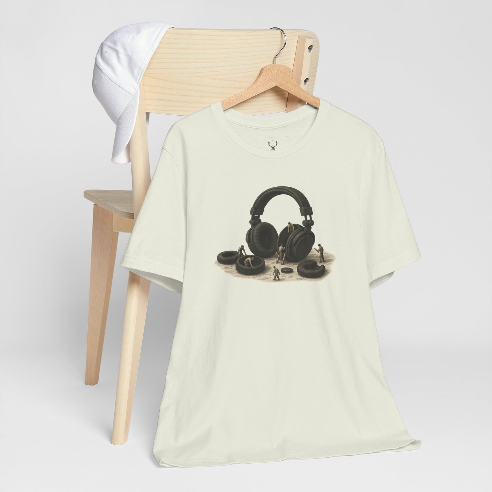 Unique Headphone Artwork T-Shirt showing creative headphone design with tiny workers illustration, perfect for music fashion.