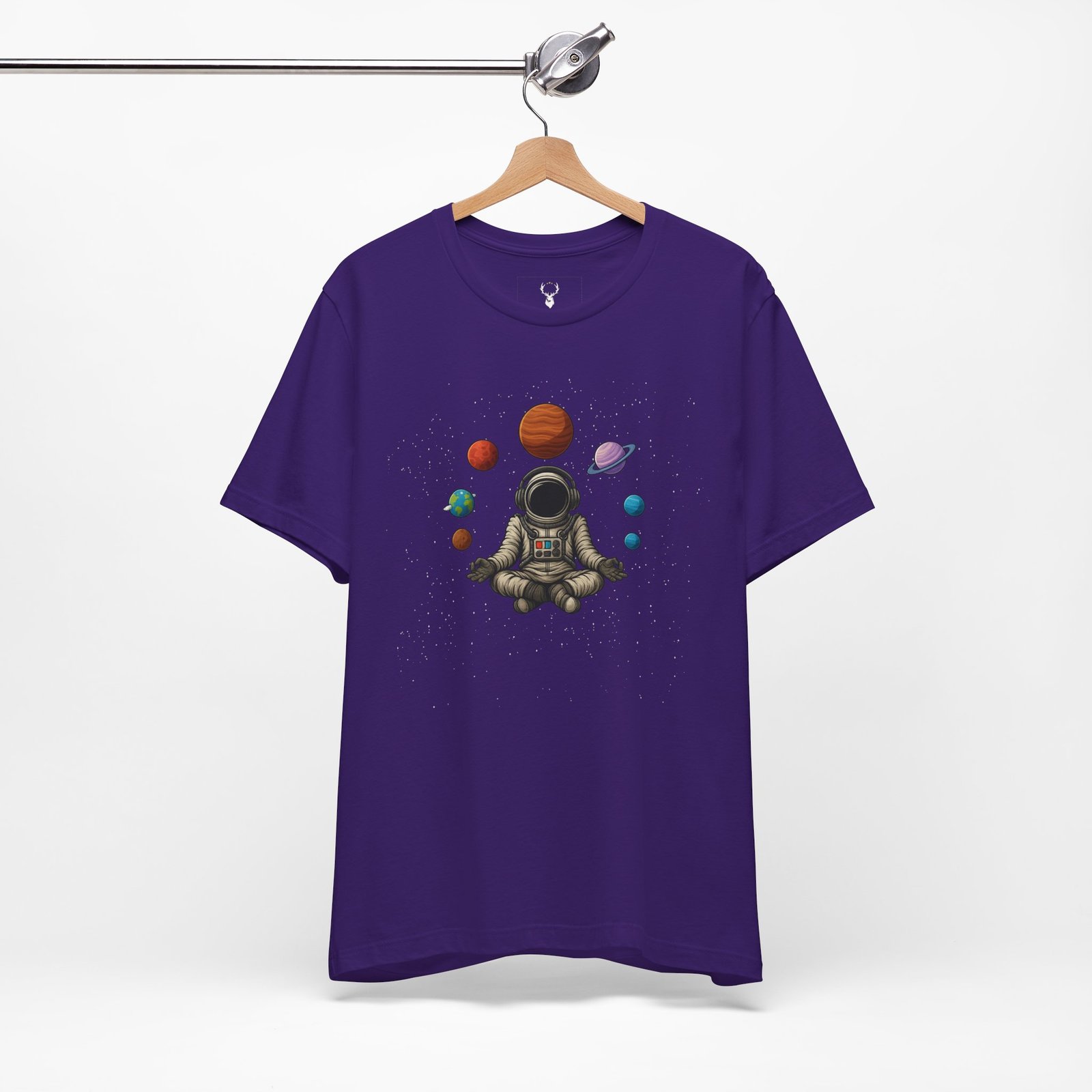 Intergalactic festival astronaut t-shirt with solar system artwork, meditation pose, and cosmic psychedelic streetwear design.