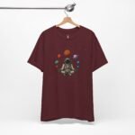 Unique cosmic astronaut meditation t-shirt with galaxy planets artwork, futuristic festival streetwear, and EDM vibes.