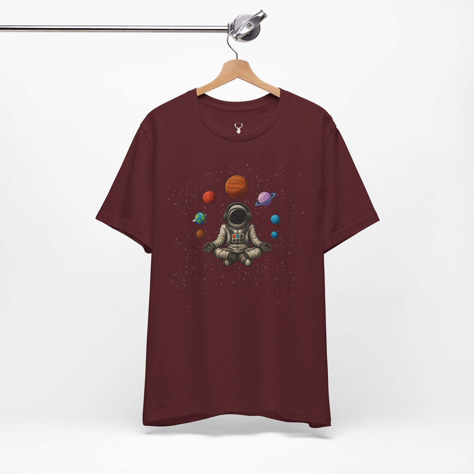 Unique cosmic astronaut meditation t-shirt with galaxy planets artwork, futuristic festival streetwear, and EDM vibes.