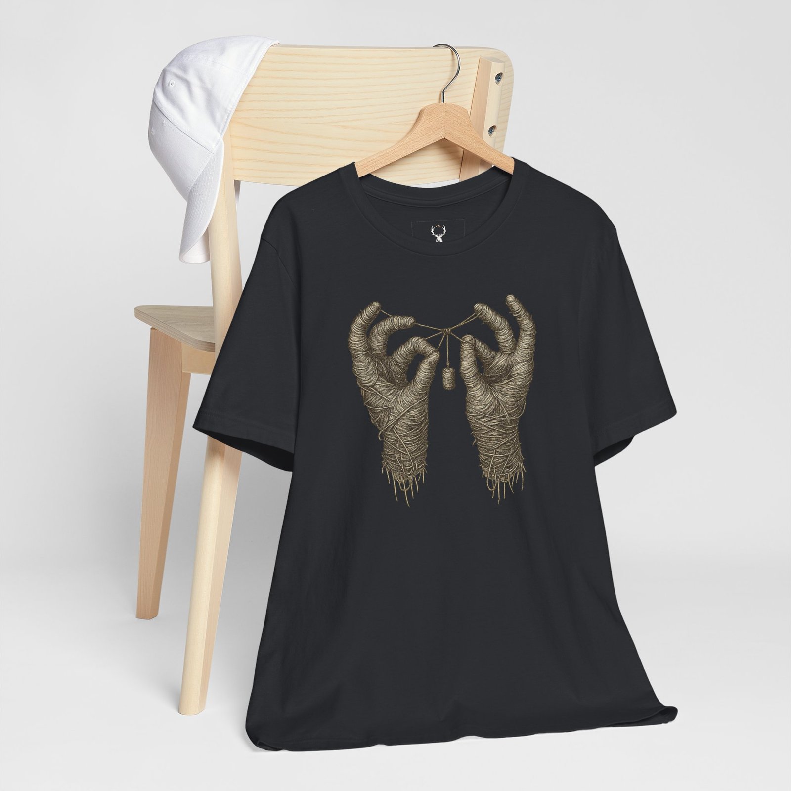 Gothic EDM fashion T-shirt with creepy mummy hands artwork, ideal for ravers and DJs.