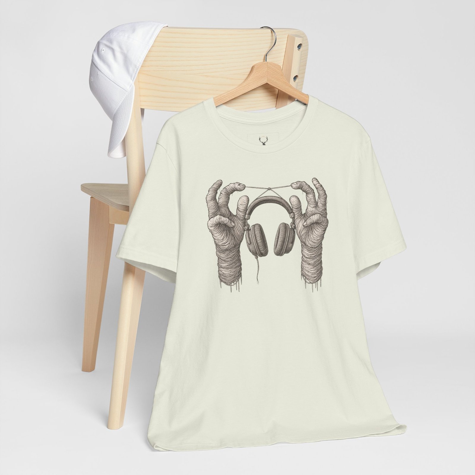 Gothic-inspired DJ T-Shirt with skeleton hands holding headphones, designed for music producers, EDM concerts, and rave festivals.