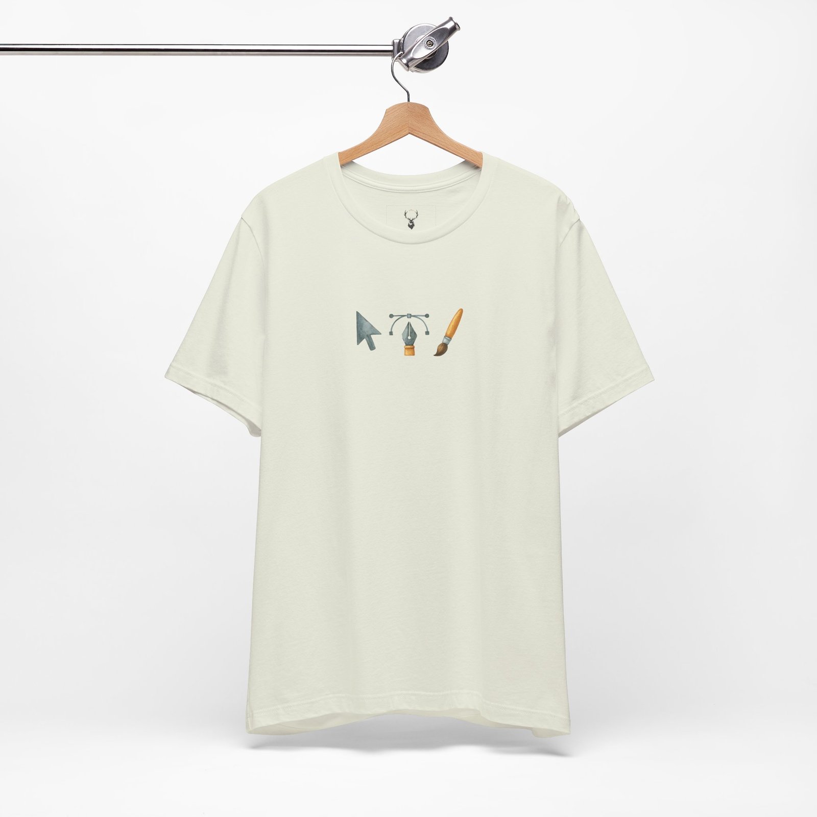 Crisp, centered icons highlight the cursor, pen tool, and brush on this illustrator tools graphic tee, a breathable artistic icons cotton tee designed for designers, UI/UX pros, and digital artists who prefer minimalist streetwear.