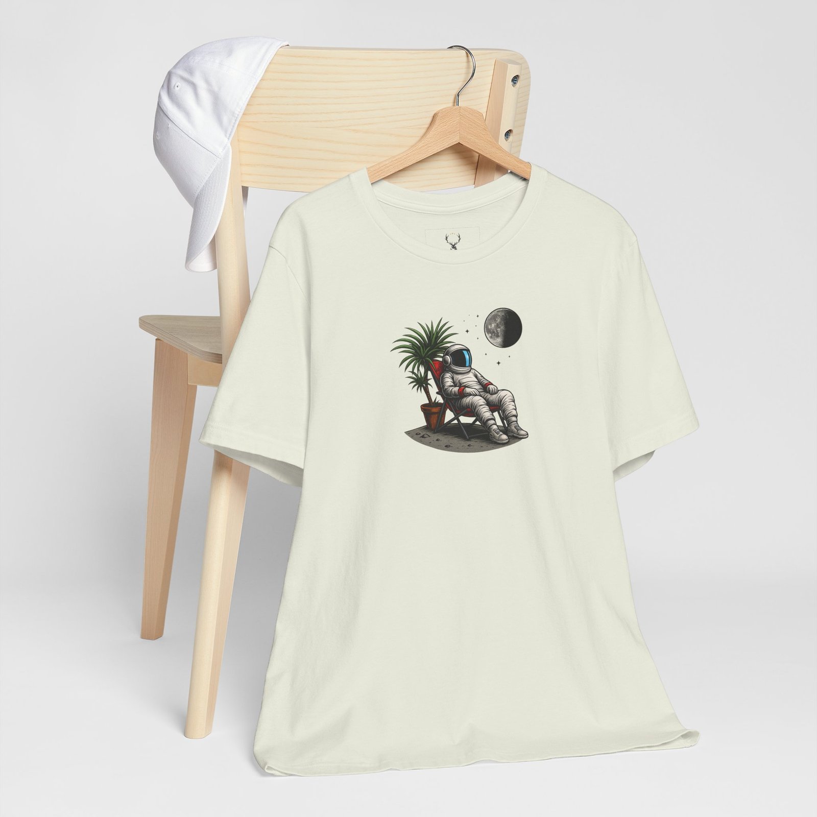 Astronaut Relaxing T-Shirt with space aesthetic design, moon detail, and futuristic artwork.