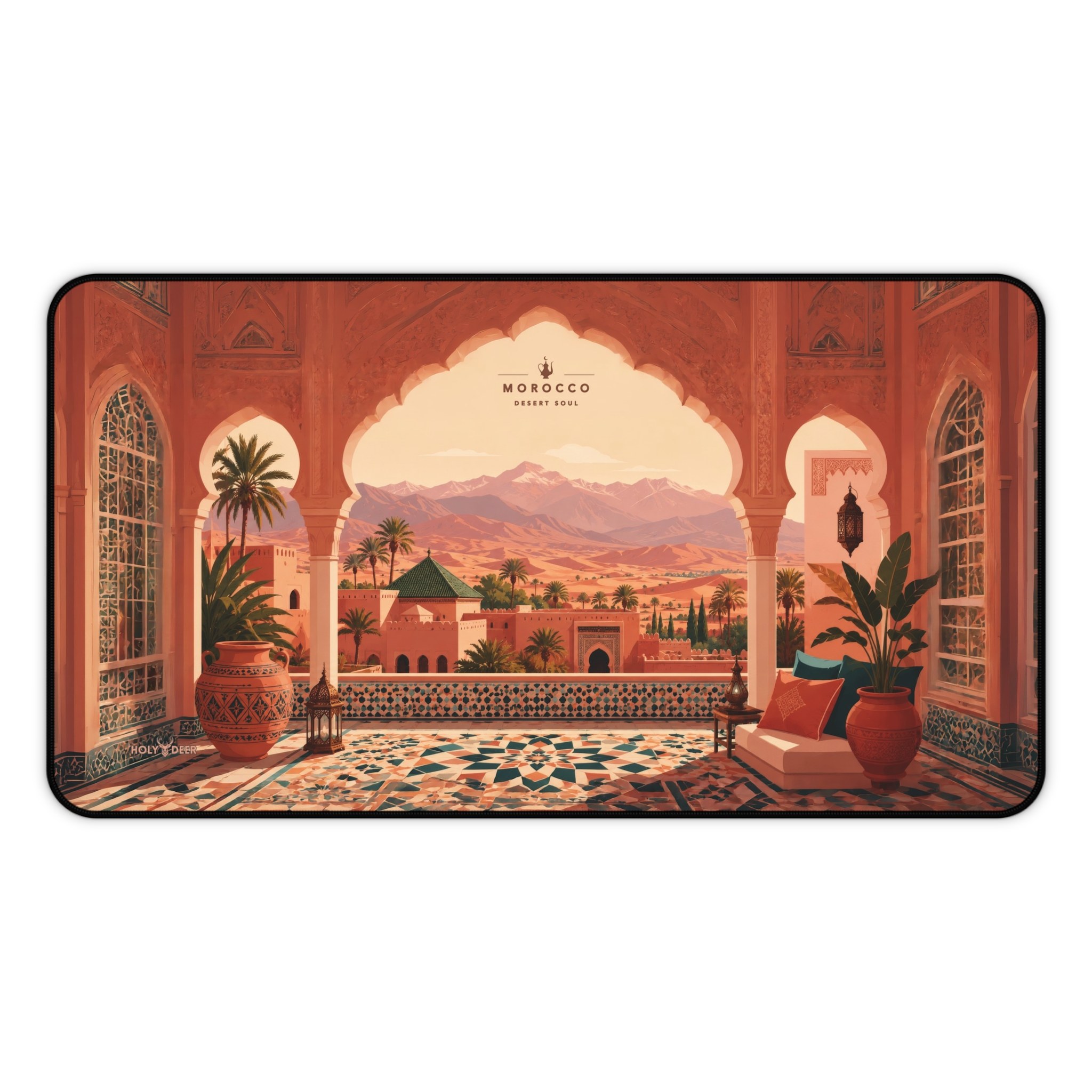 Morocco desk mat with illustrated terrace artwork, warm terracotta tones, palm trees, and a distant desert landscape.