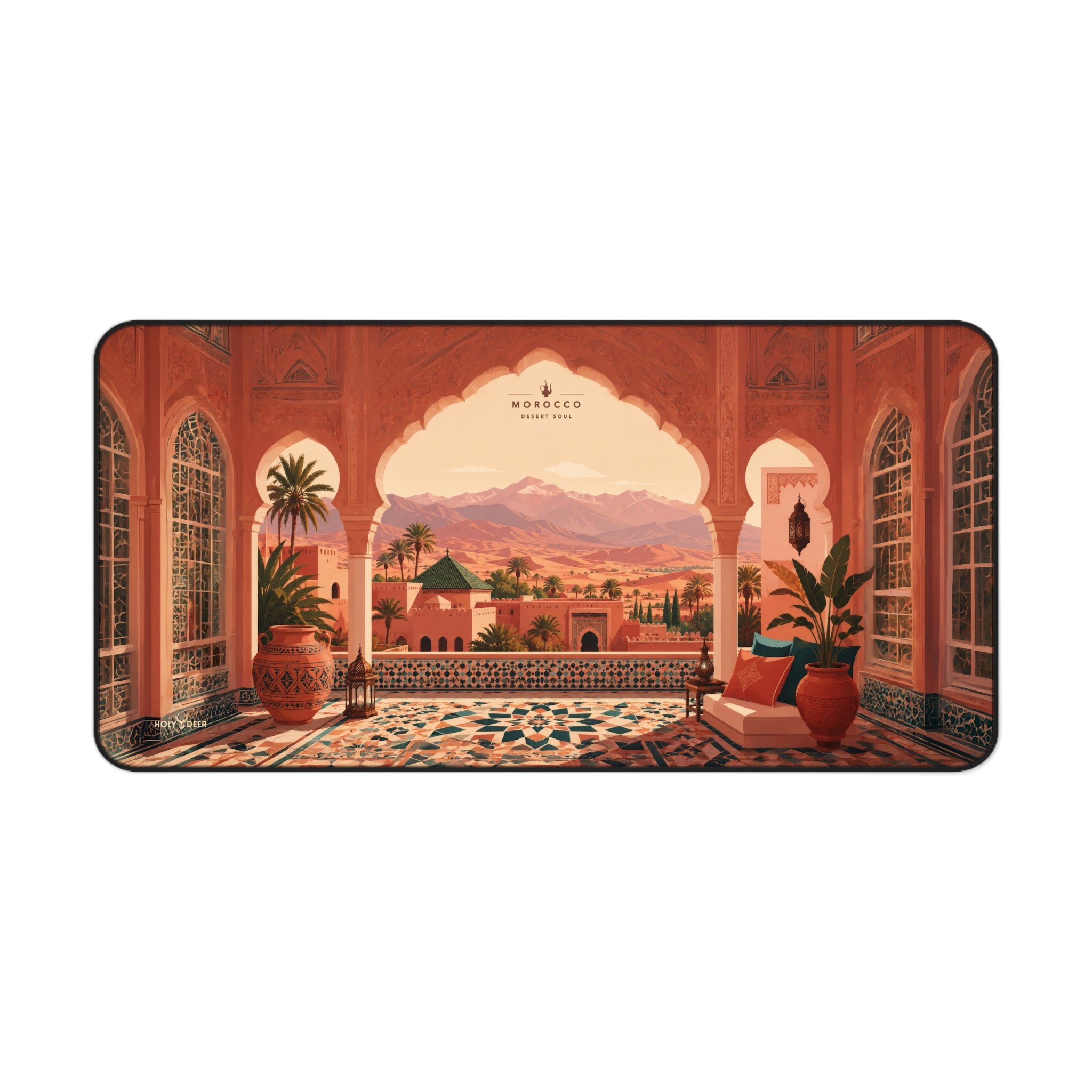 Moroccan landscape desk mat featuring arches, geometric tilework, palms, and mountains in a warm desert palette.