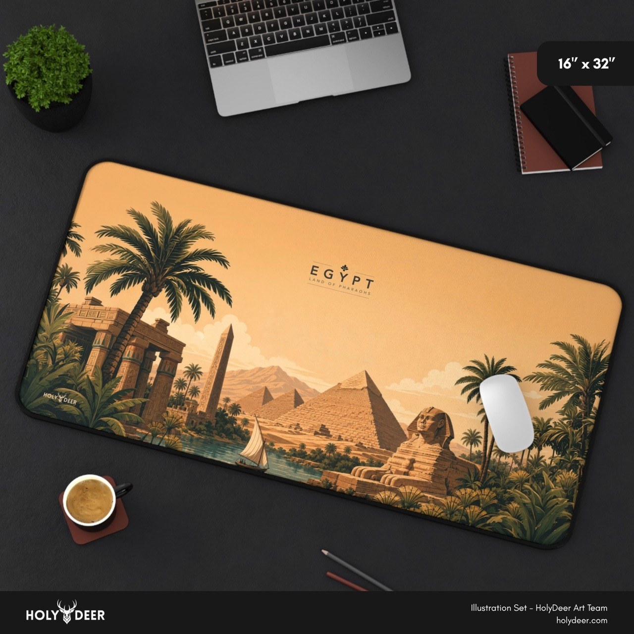 HOLY DEER Egypt desk mat showing pyramids, the Sphinx and palm-lined river scenery in a warm illustrated style.